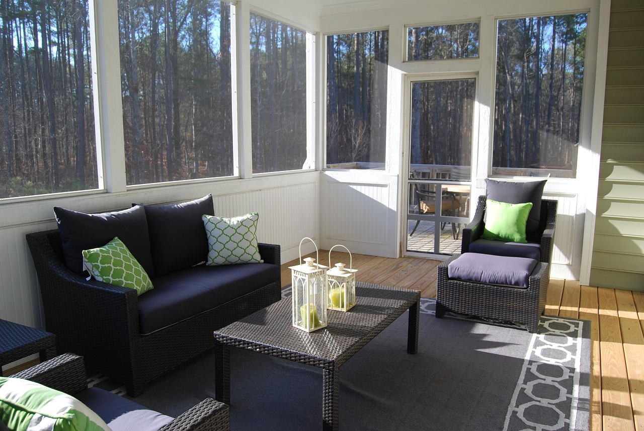 Modern glass-enclosed sun veranda in summer light. Modern glass-enclosed sun veranda in summer light.
