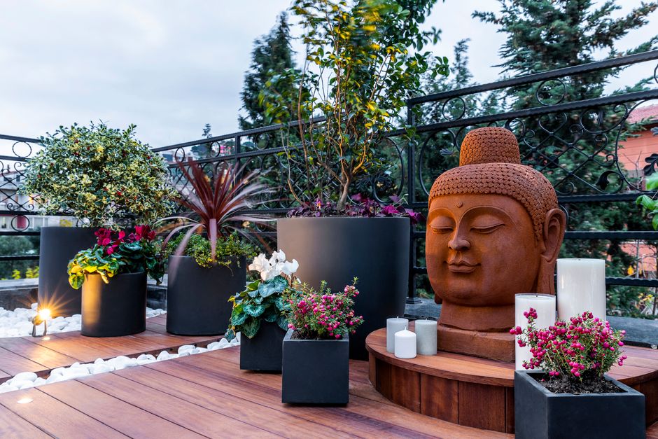 Cozy balcony with meditation cushions and plants. Cozy balcony with meditation cushions and plants.