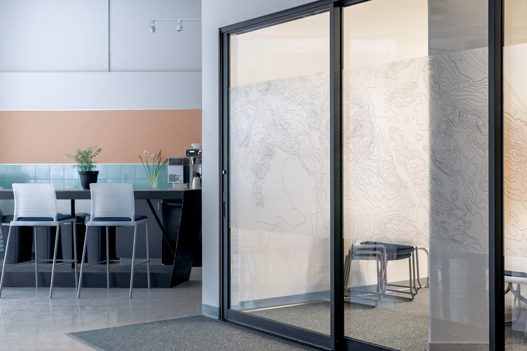 Modern glazed door offers seamless outdoor transition Modern glazed door offers seamless outdoor transition