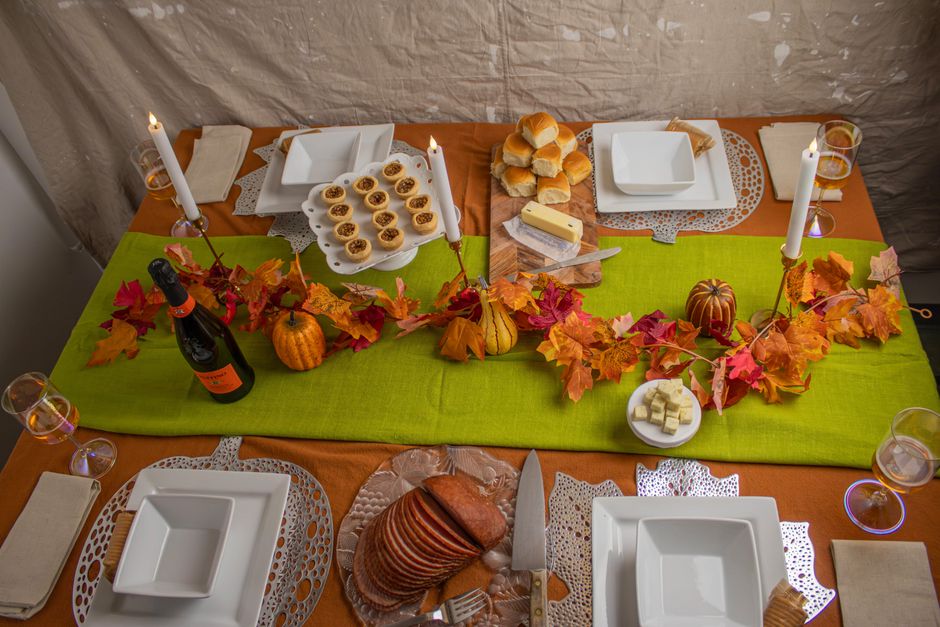 Stylish autumn centerpiece with candles and leaves. Stylish autumn centerpiece with candles and leaves.