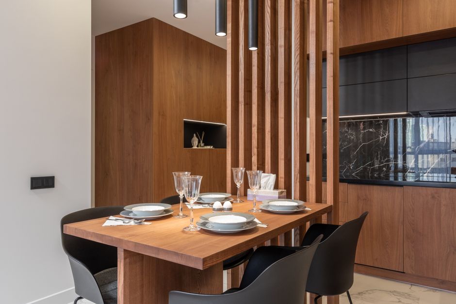 Cozy dining setting with acoustic wall panels. Cozy dining setting with acoustic wall panels.