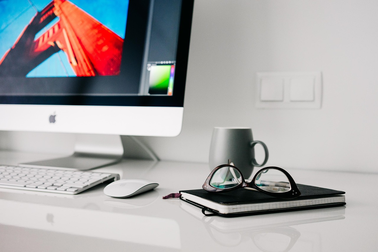 Minimalistic home workspace with soothing green accents. Minimalistic home workspace with soothing green accents.